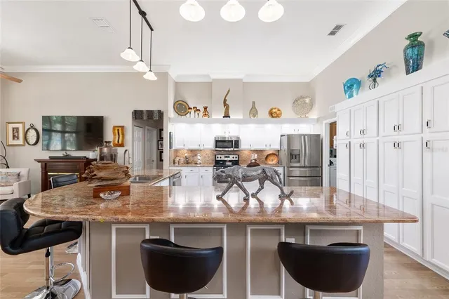 a very nice looking living room with furniture and wooden floor