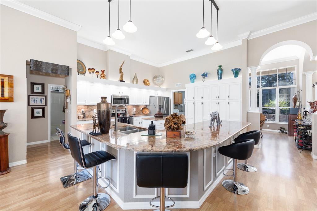 11615 Southwest 72nd Circle Ocala, FL 34476 - Photo 15 of 51 a very nice looking living room with furniture and wooden floor
