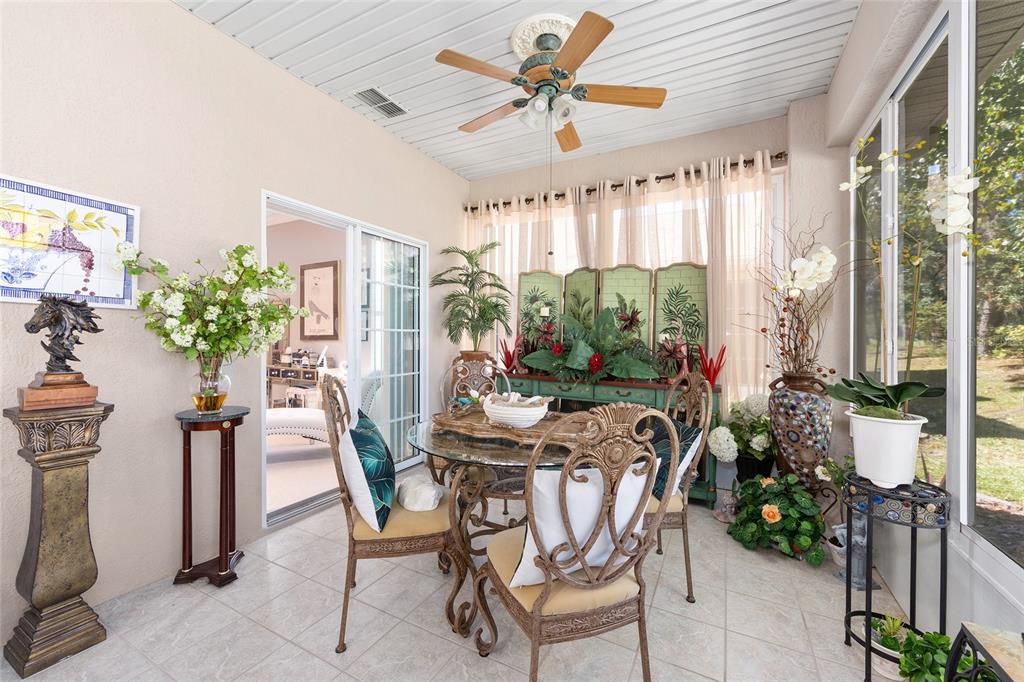11615 Southwest 72nd Circle Ocala, FL 34476 - Photo 23 of 51 a view of a dining room with furniture window and wooden floor