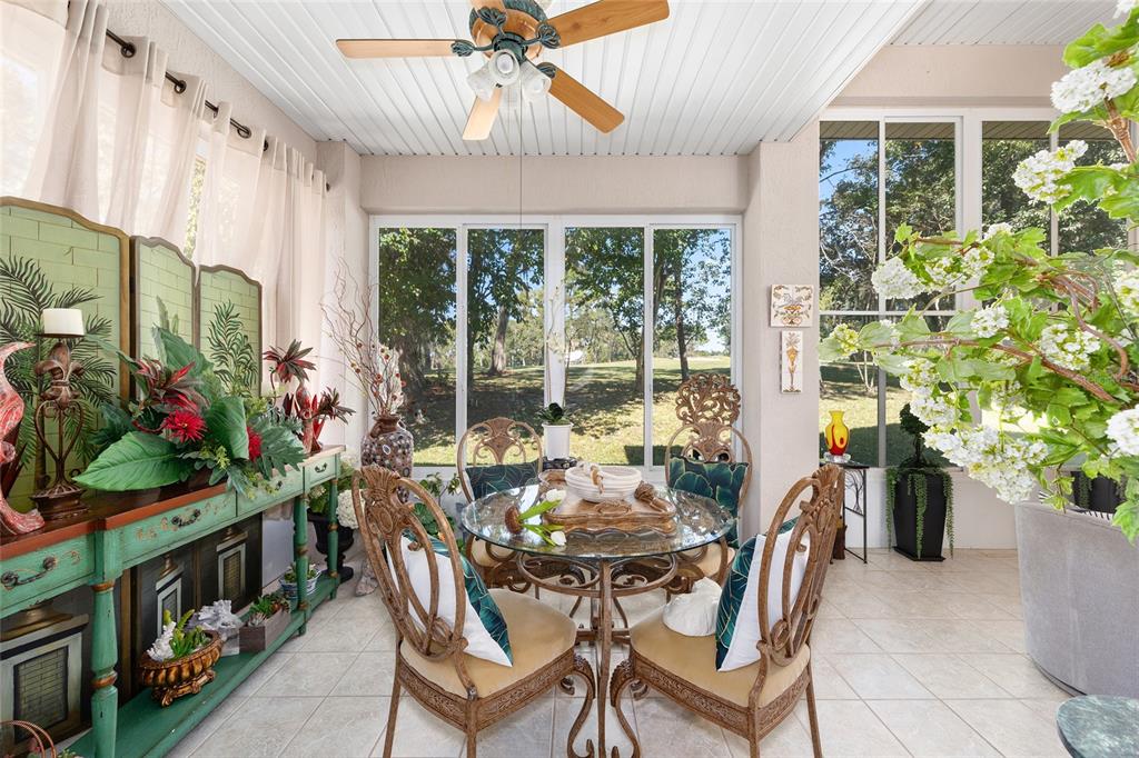 11615 Southwest 72nd Circle Ocala, FL 34476 - Photo 24 of 51 a view of a dining room with furniture window and outdoor view