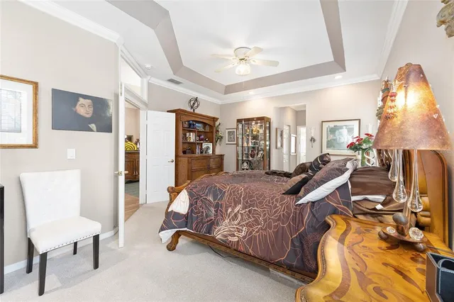 a bed room with a bed and a bathroom