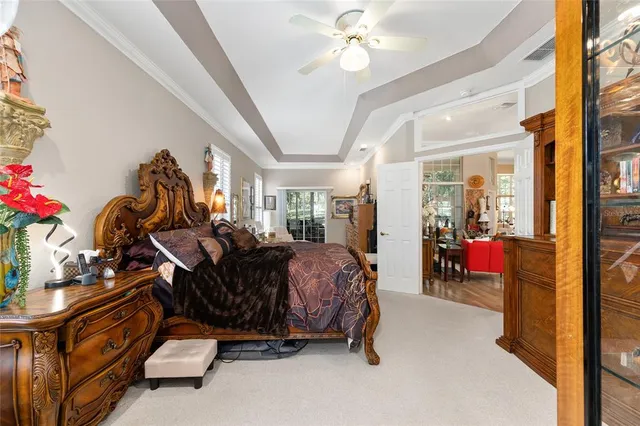 a bedroom with furniture and a window