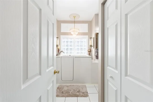 a bathroom with a sink vanity and mirror
