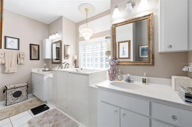 a bed room with furniture and a window