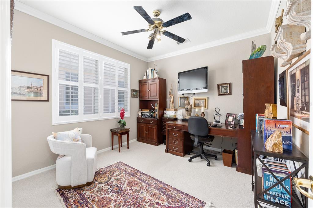 11615 Southwest 72nd Circle Ocala, FL 34476 - Photo 40 of 51 a living room with furniture and a window