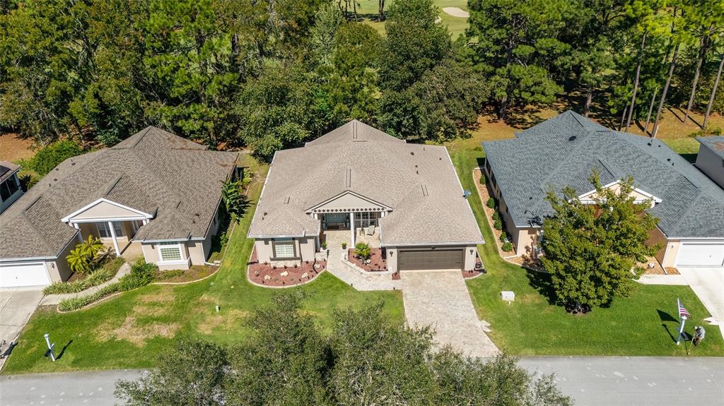 11615 Southwest 72nd Circle Ocala, FL 34476 - Photo 47 of 51 an aerial view of a house with swimming pool and porch