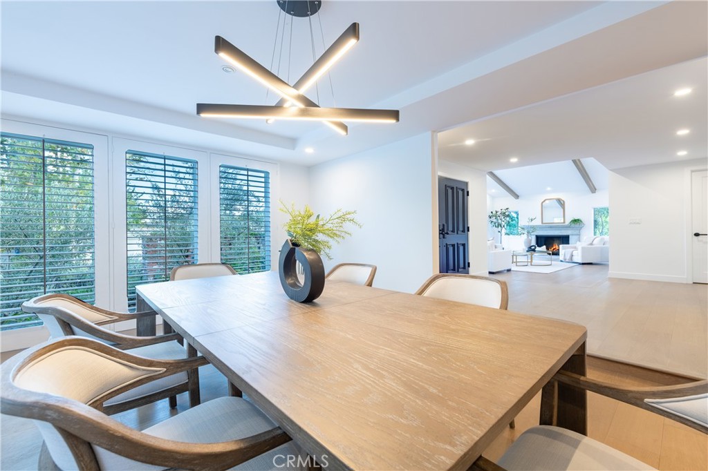 17153 Adlon Road Encino, CA 91436 - Photo 8 of 43 a dining room with furniture and window