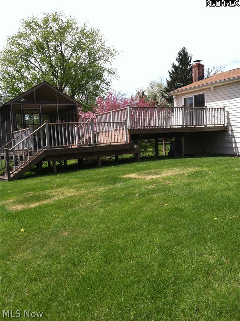 9959 Bell Road Newbury, OH 44065 - Photo 9 of 10 Deck and screen house with steps to back yard.