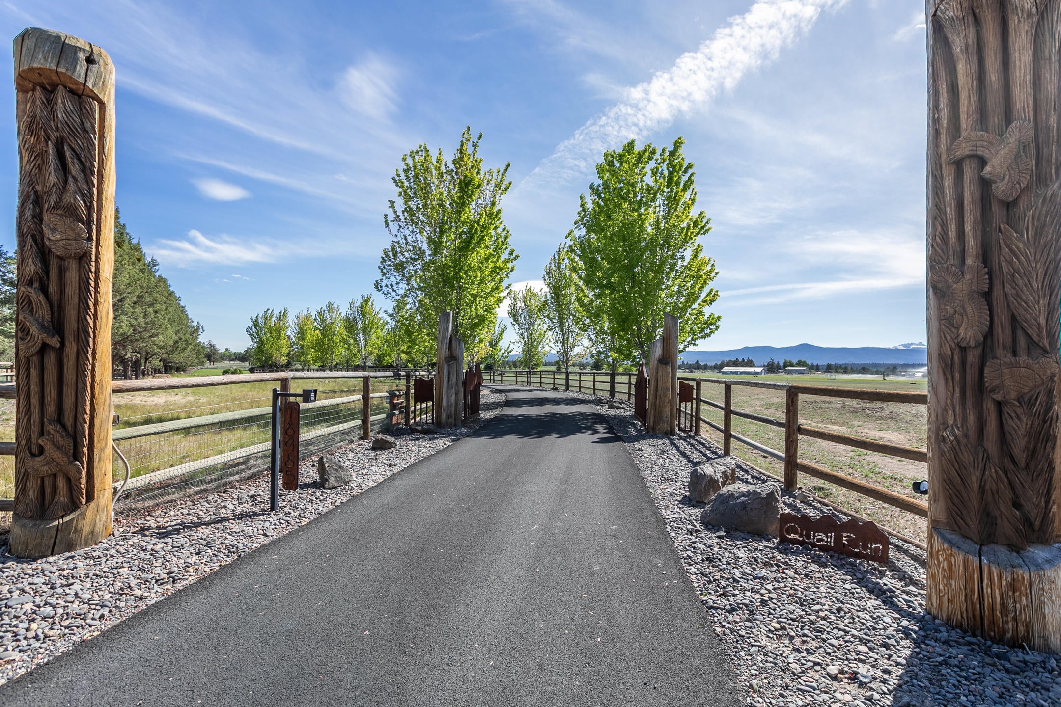 65105 Quail Farm Road Bend, OR 97703 - Photo 4 of 27 Artisan Heavy Timber Entrance with Custom Security Gate!