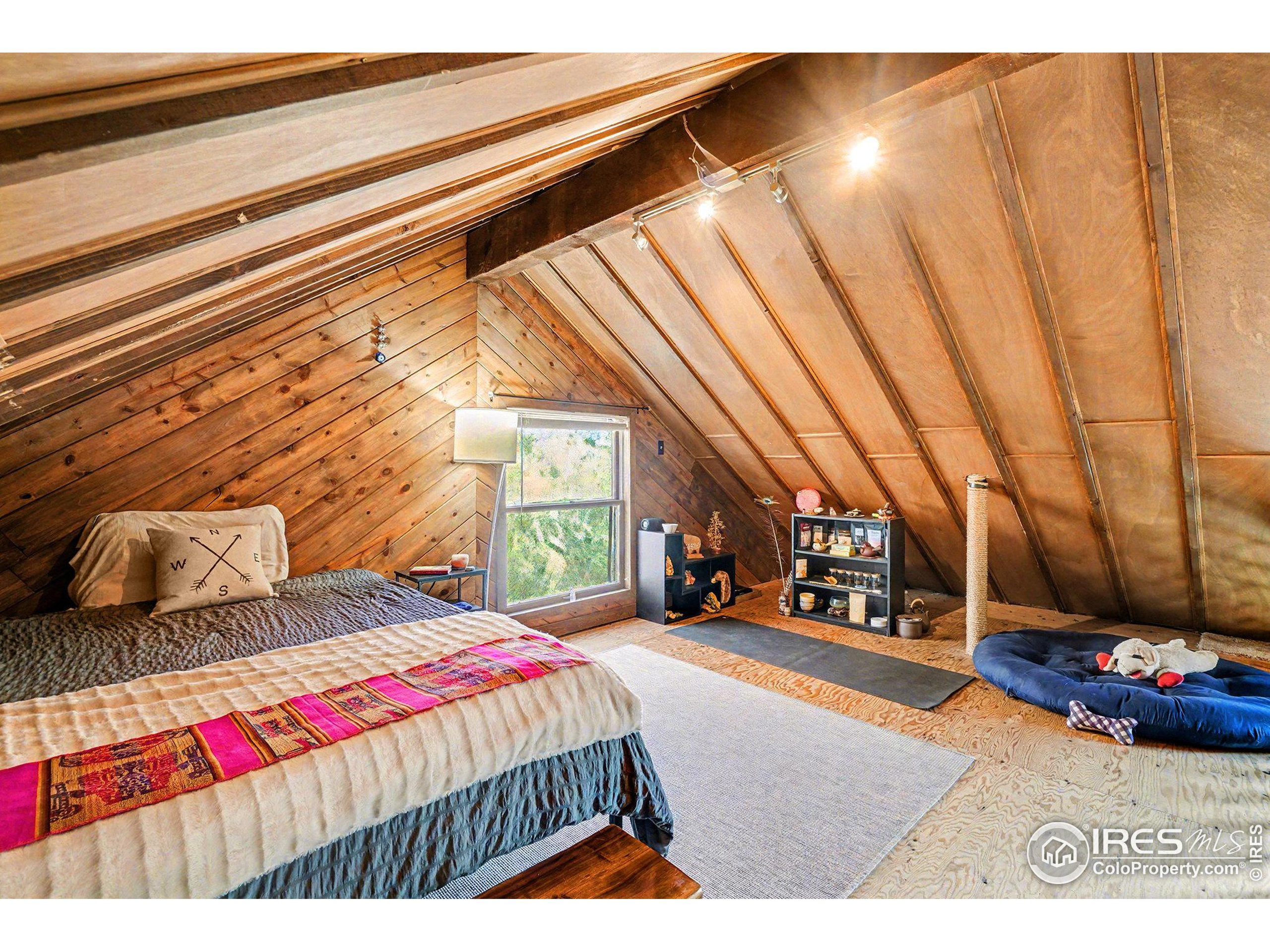 280 Streamside Drive Drake, CO 80515 - Photo 14 of 26 a bedroom with a bed and a night stand