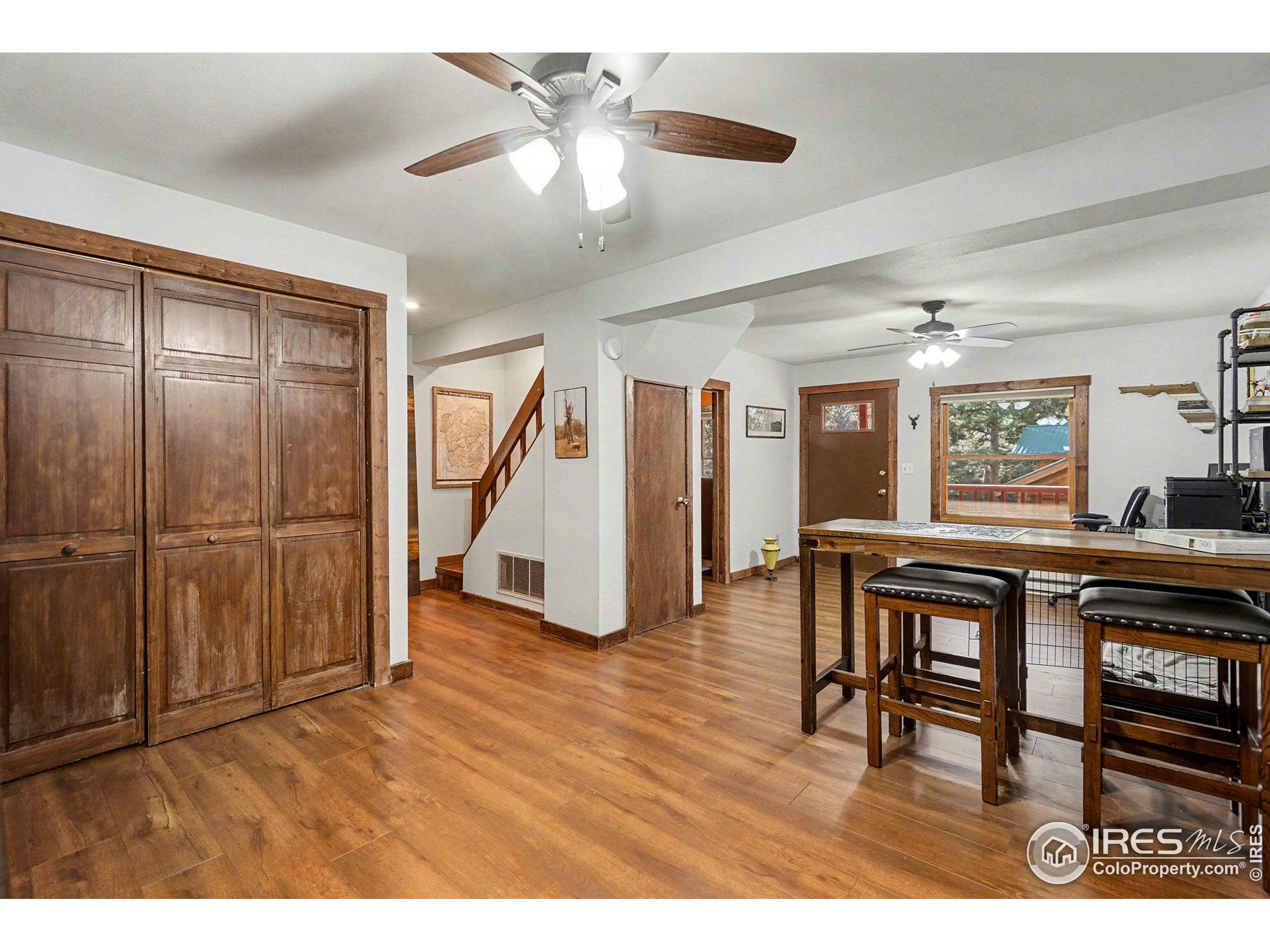 280 Streamside Drive Drake, CO 80515 - Photo 16 of 26 a view of a livingroom with furniture and staircase