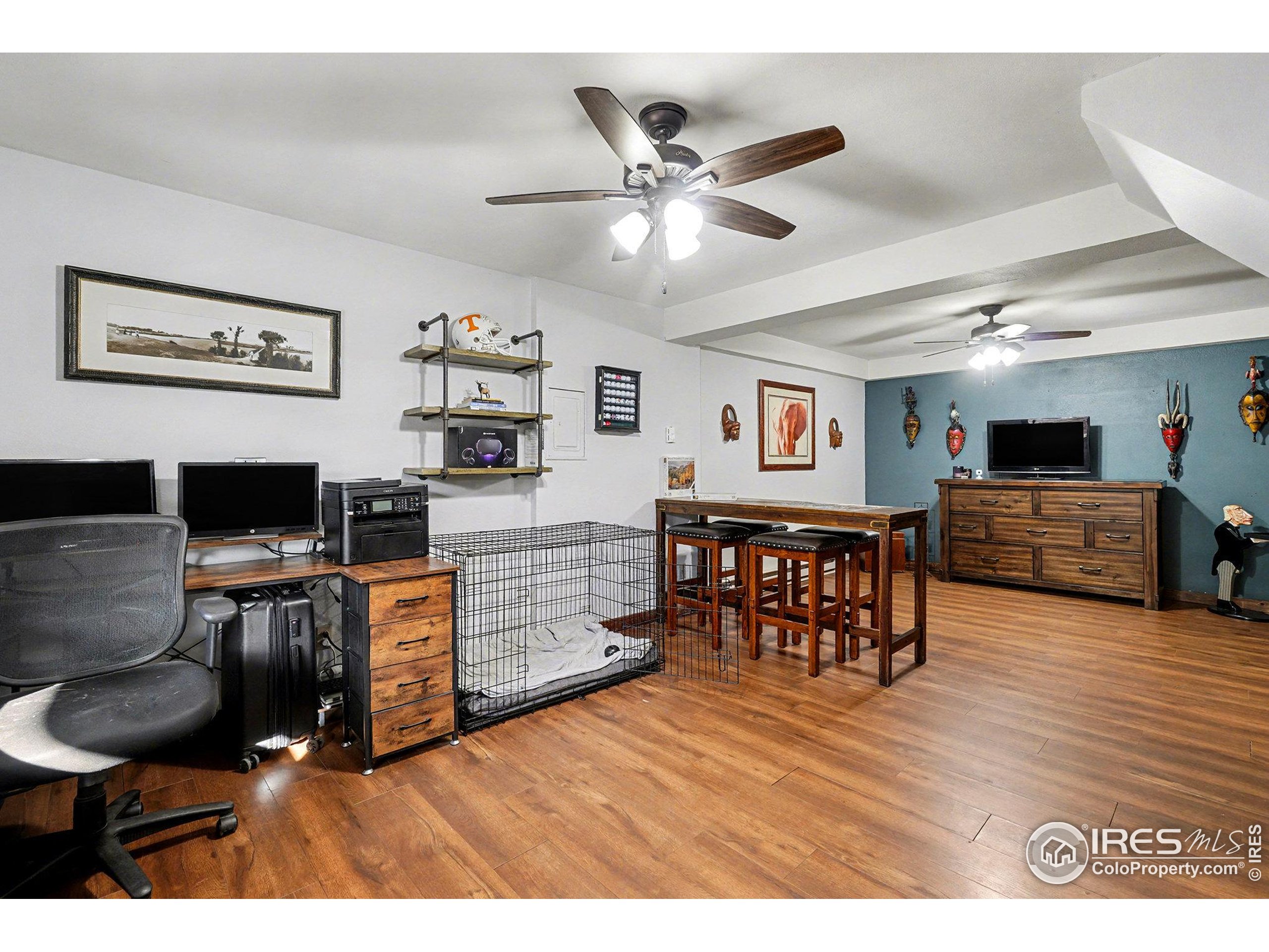 280 Streamside Drive Drake, CO 80515 - Photo 17 of 26 a living room with furniture and wooden floor