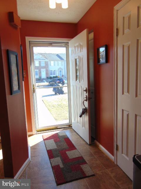 8716 Silver Hall Road Perry Hall, MD 21128 - Photo 2 of 22 Welcome Home! Entry Hall~Coat Closet & Half Bath