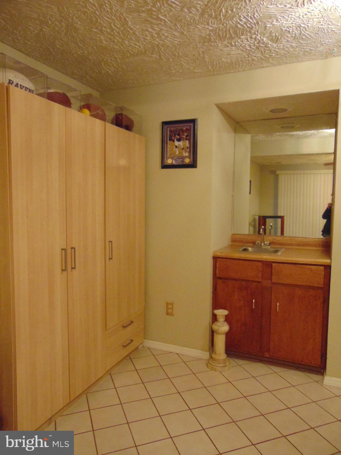 8716 Silver Hall Road Perry Hall, MD 21128 - Photo 16 of 22 Wet Bar~Great for Parties..Storage Unit Conveys!