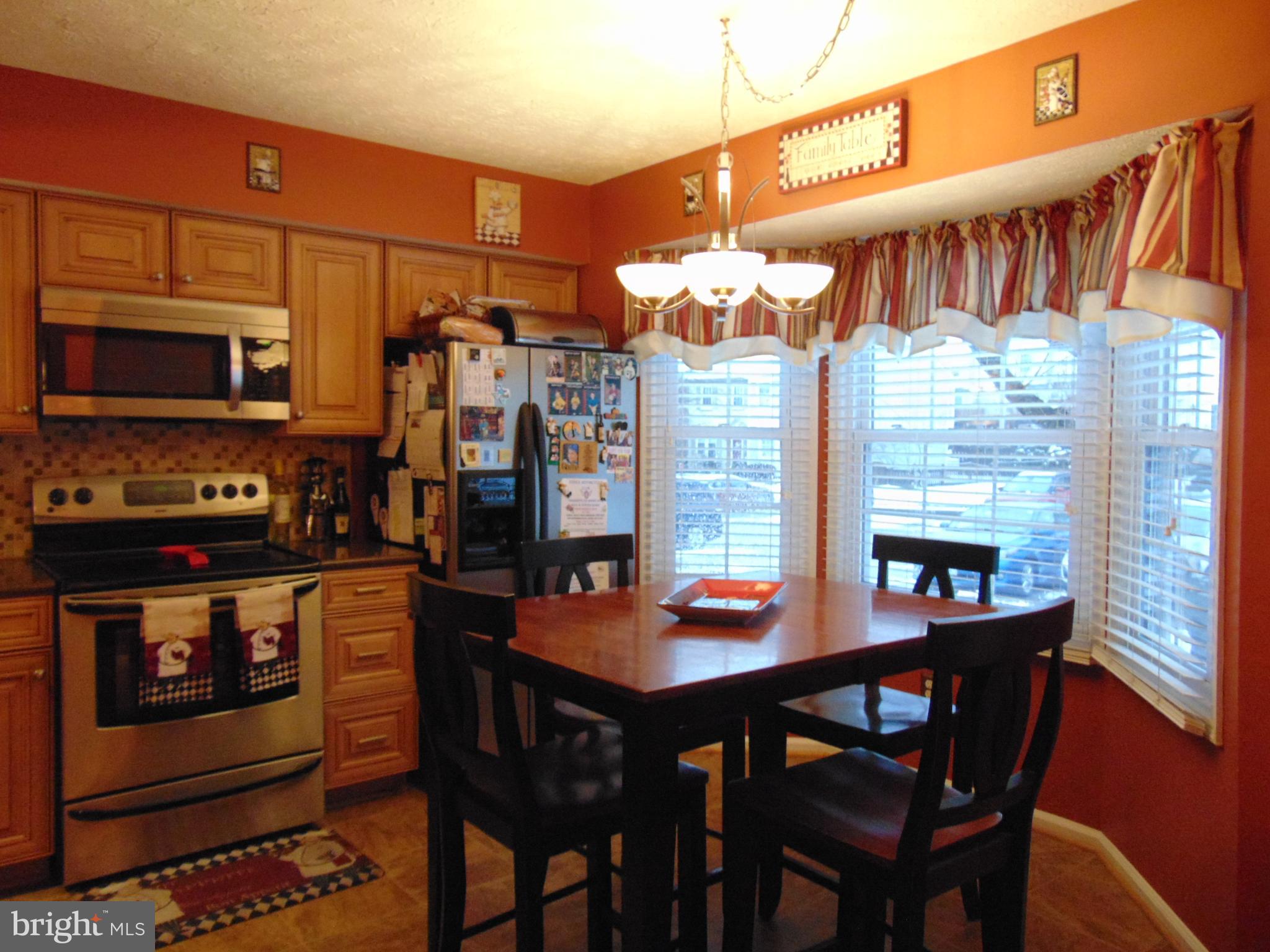 8716 Silver Hall Road Perry Hall, MD 21128 - Photo 3 of 22 Bright Front Kitchen complimented by Bay Window
