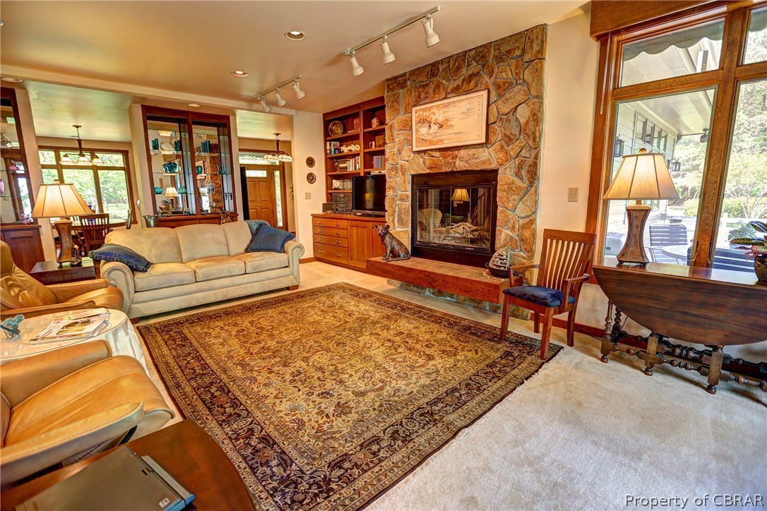 3678 Windmill Point Road White Stone, VA 22578 - Photo 11 of 50 Grand family room with rich built-ins and hearth