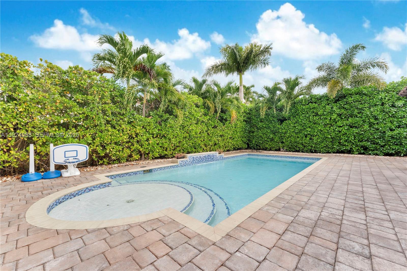14929 Southwest 176th Terrace Miami, FL 33187 - Photo 26 of 38 a view of outdoor space yard and swimming pool
