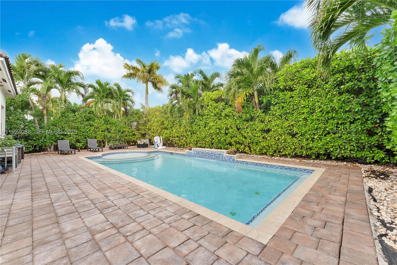 14929 Southwest 176th Terrace Miami, FL 33187 - Photo 27 of 38 a view of swimming pool from a balcony