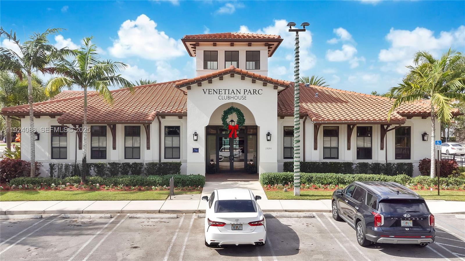 14929 Southwest 176th Terrace Miami, FL 33187 - Photo 33 of 38 a car parked in front of a house