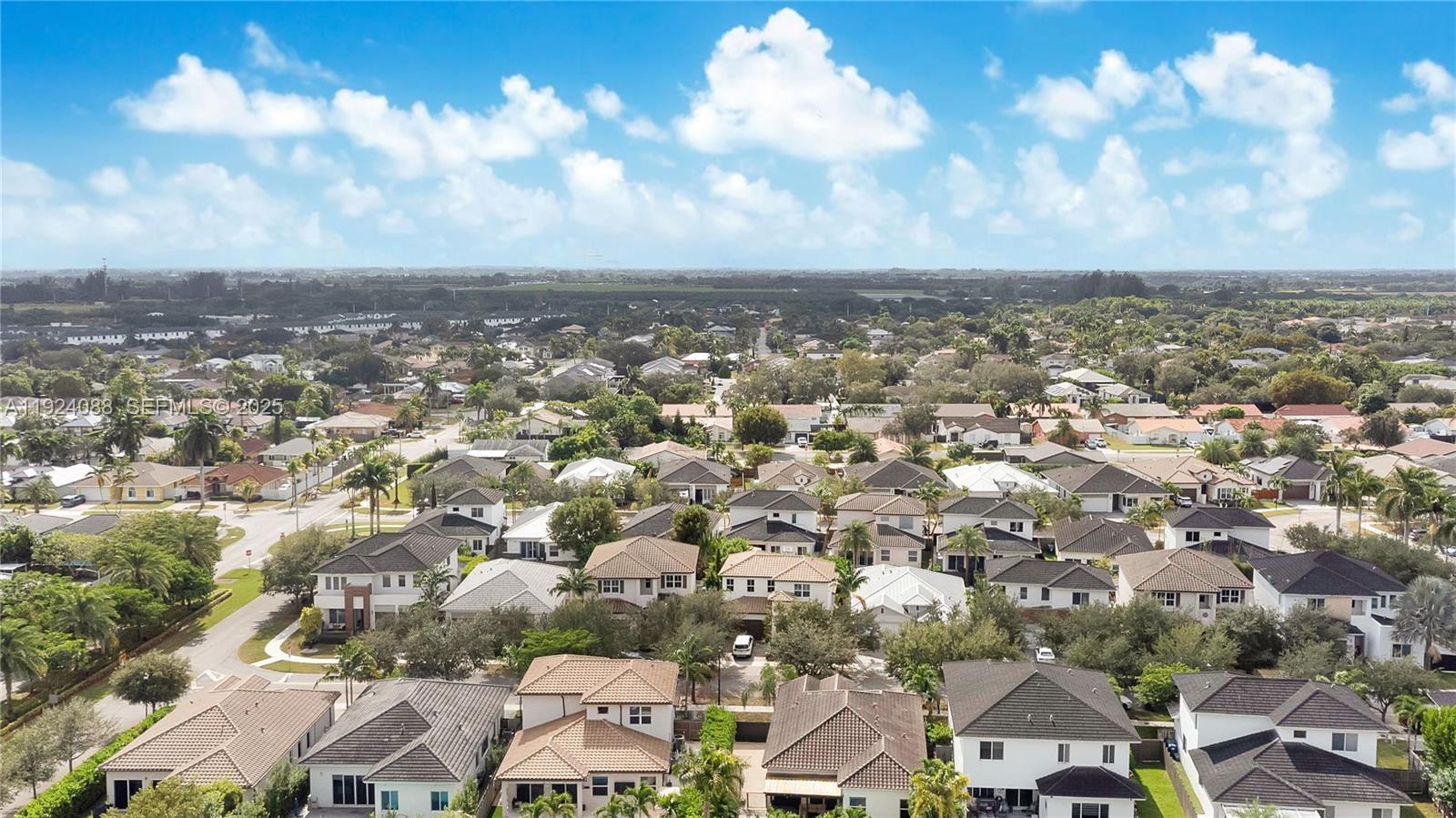 14929 Southwest 176th Terrace Miami, FL 33187 - Photo 38 of 38 an aerial view of a city