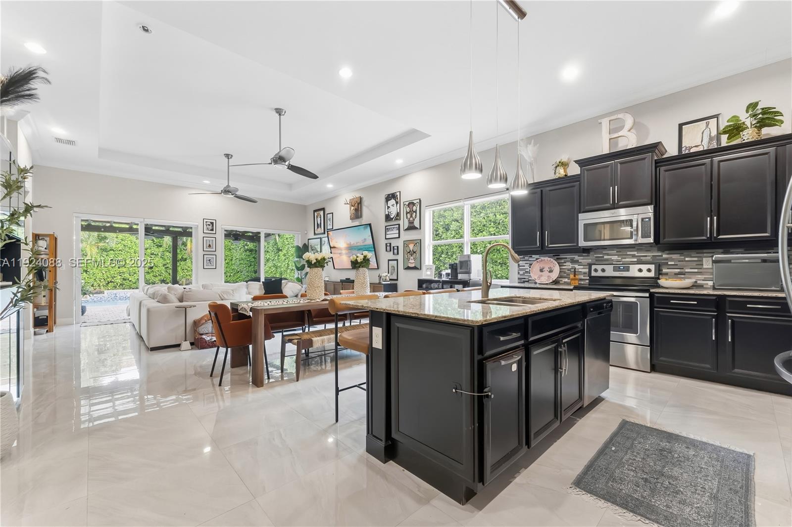 14929 Southwest 176th Terrace Miami, FL 33187 - Photo 7 of 38 a kitchen with lots of counter top space