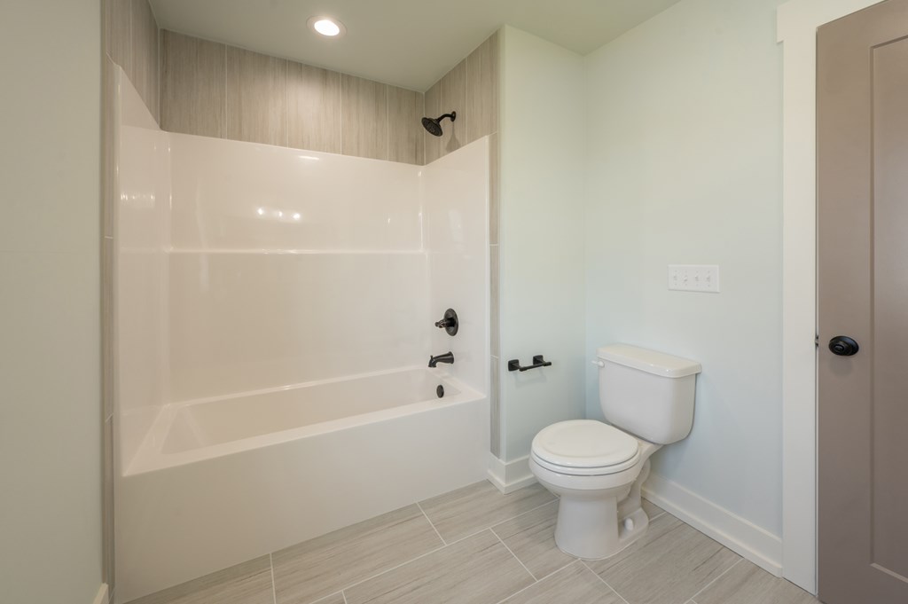 1190 Lee Road Phenix City, AL 36870 - Photo 44 of 52 a bathroom with a toilet and a shower