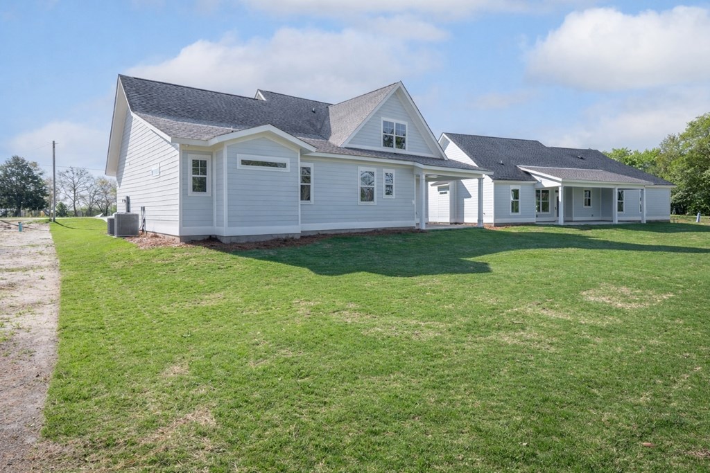 1190 Lee Road Phenix City, AL 36870 - Photo 50 of 52 a front of a house with a yard