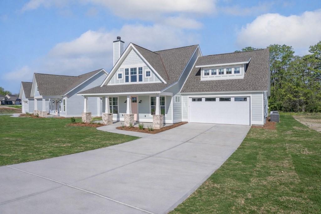 1190 Lee Road Phenix City, AL 36870 - Photo 7 of 52 a front view of a house with yard and green space
