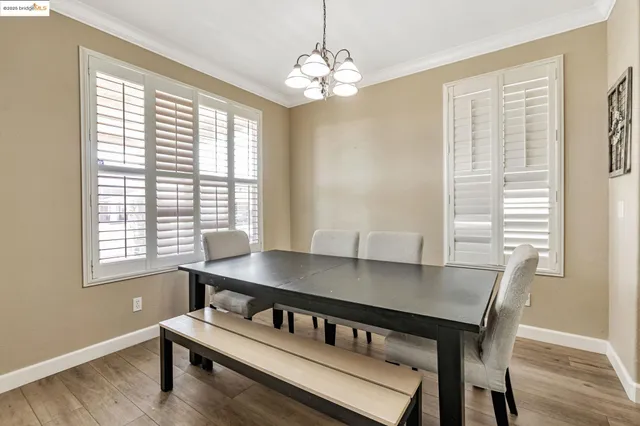 a open kitchen with stainless steel appliances granite countertop a sink stove and refrigerator