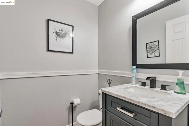 a spacious bedroom with a bed and window