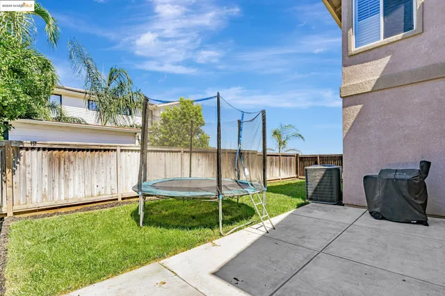 a house view with a outdoor space