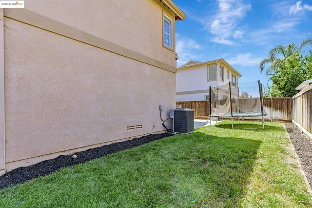 a view of backyard with green space
