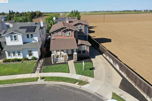a view of a backyard with a garden