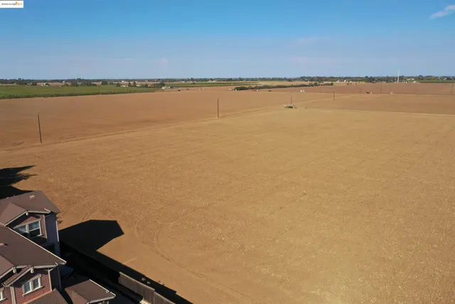 a view of a city with an ocean