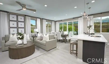 175 Almanac Street Hemet, CA 92543 - Photo 3 of 7 a living room with furniture and a large window