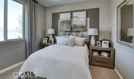 175 Almanac Street Hemet, CA 92543 - Photo 6 of 7 a bedroom with a bed and a large window