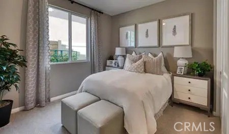 175 Almanac Street Hemet, CA 92543 - Photo 7 of 7 a bedroom with a bed and a potted plant