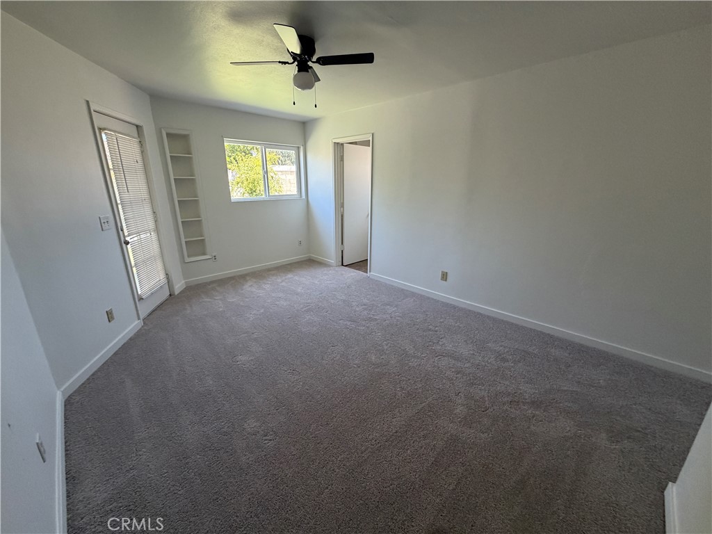 14538 Springvale Street Poway, CA 92064 - Photo 33 of 47 an empty room with windows and fan