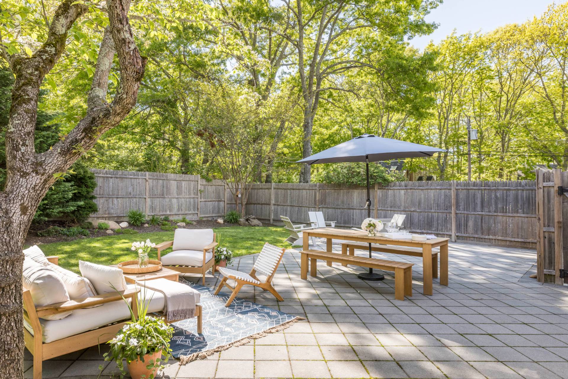 40 Ridge Road West Sag Harbor, NY 11963 - Photo 3 of 27 a view of backyard with outdoor seating and trees
