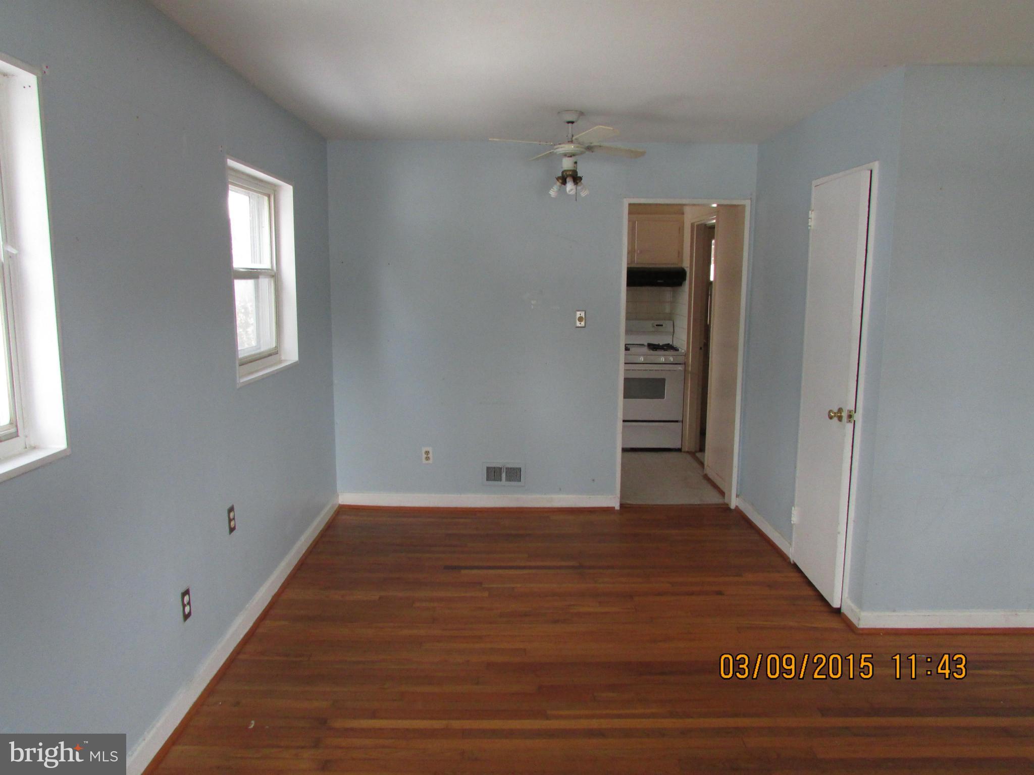3103 Weller Road Silver Spring, MD 20906 - Photo 4 of 13 a view of a hallway with wooden floor and closet