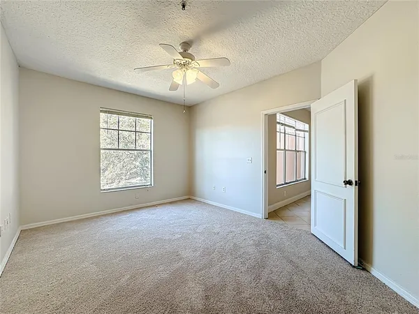 an aerial view of residential houses with outdoor space and street view