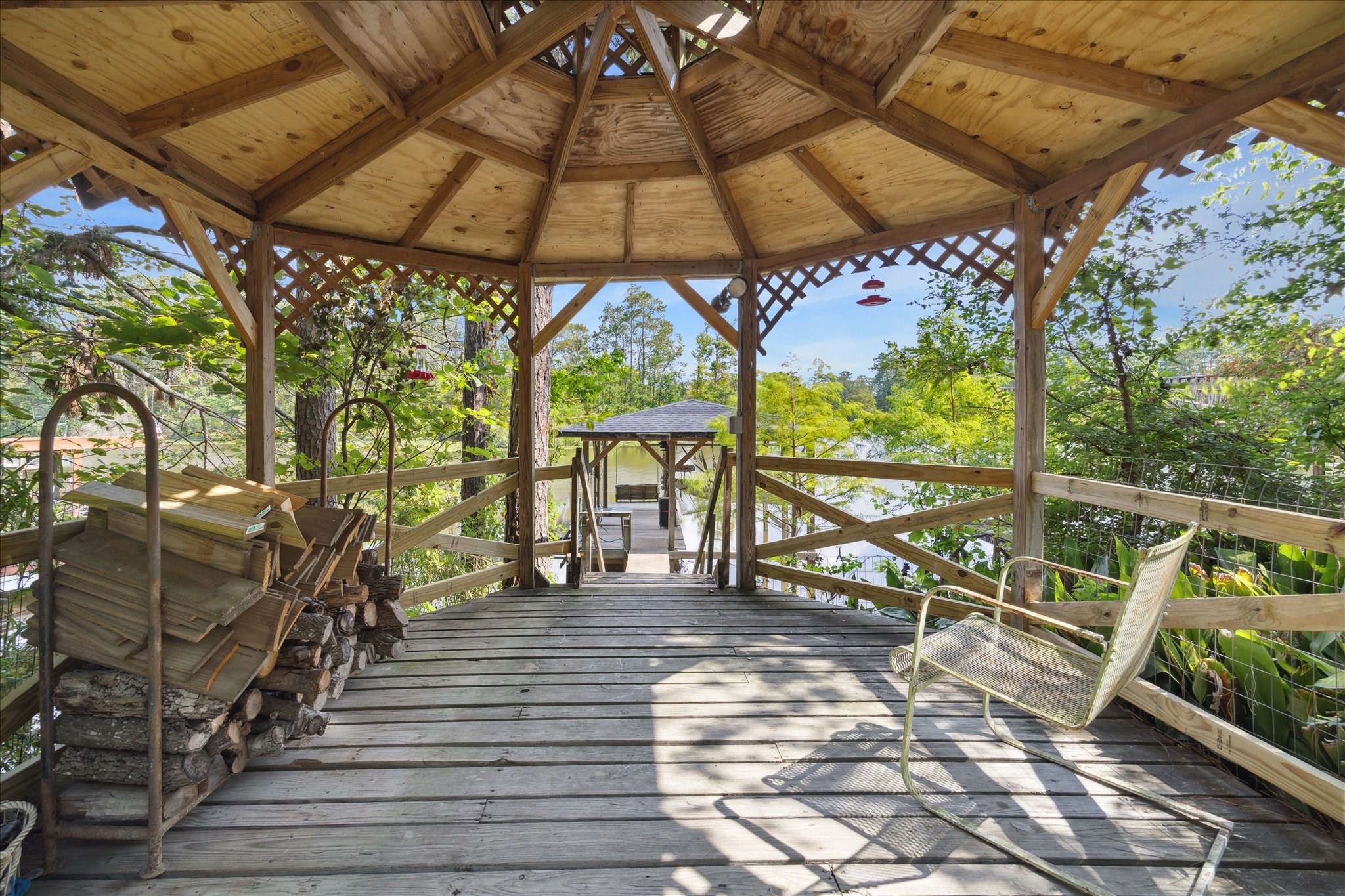 25814 Water Ridge Drive Houston, TX 77336 - Photo 31 of 41 Gazebo overlooks water. Gazebo roof - Aug 2024