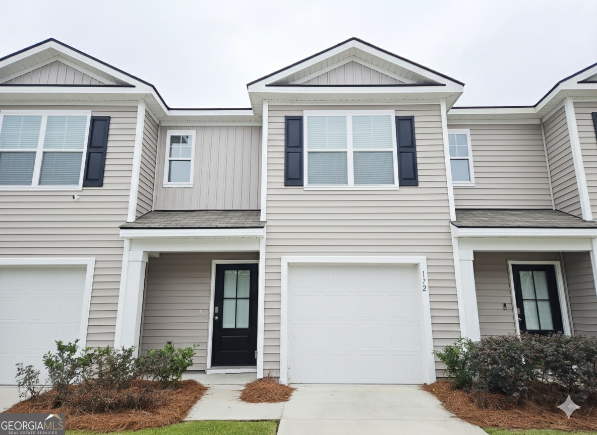 172 Coneflower Road Bloomingdale, GA 31302 - Photo 1 of 10 front view of a house