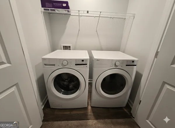 a utility room with dryer and washer