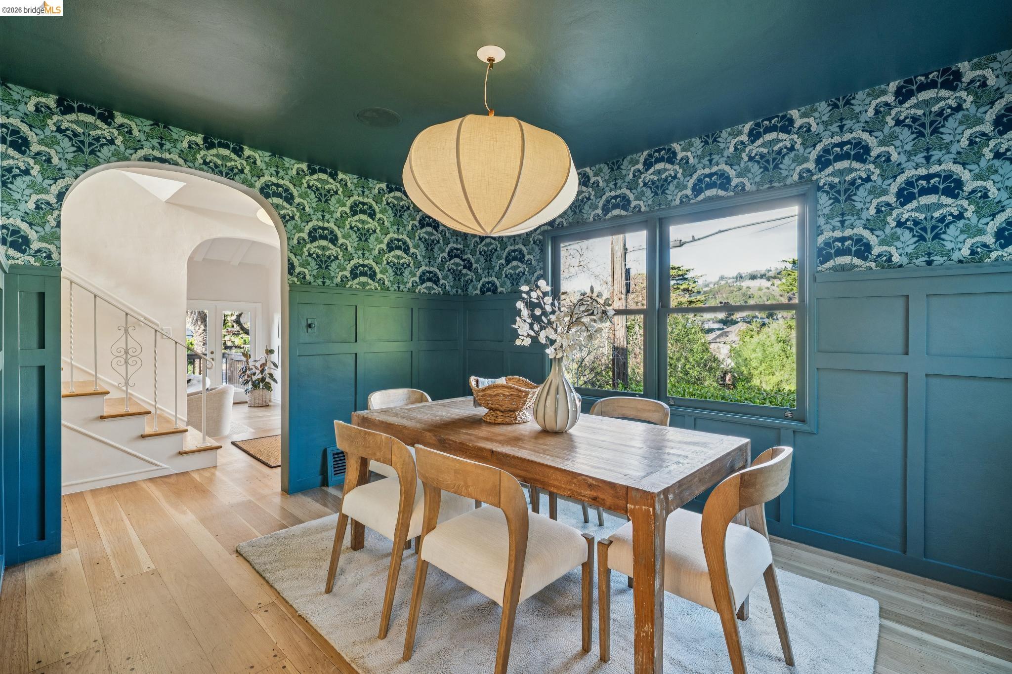 5275 Proctor Avenue Oakland, CA 94618 - Photo 15 of 43 a view of a dining room with a table and chairs