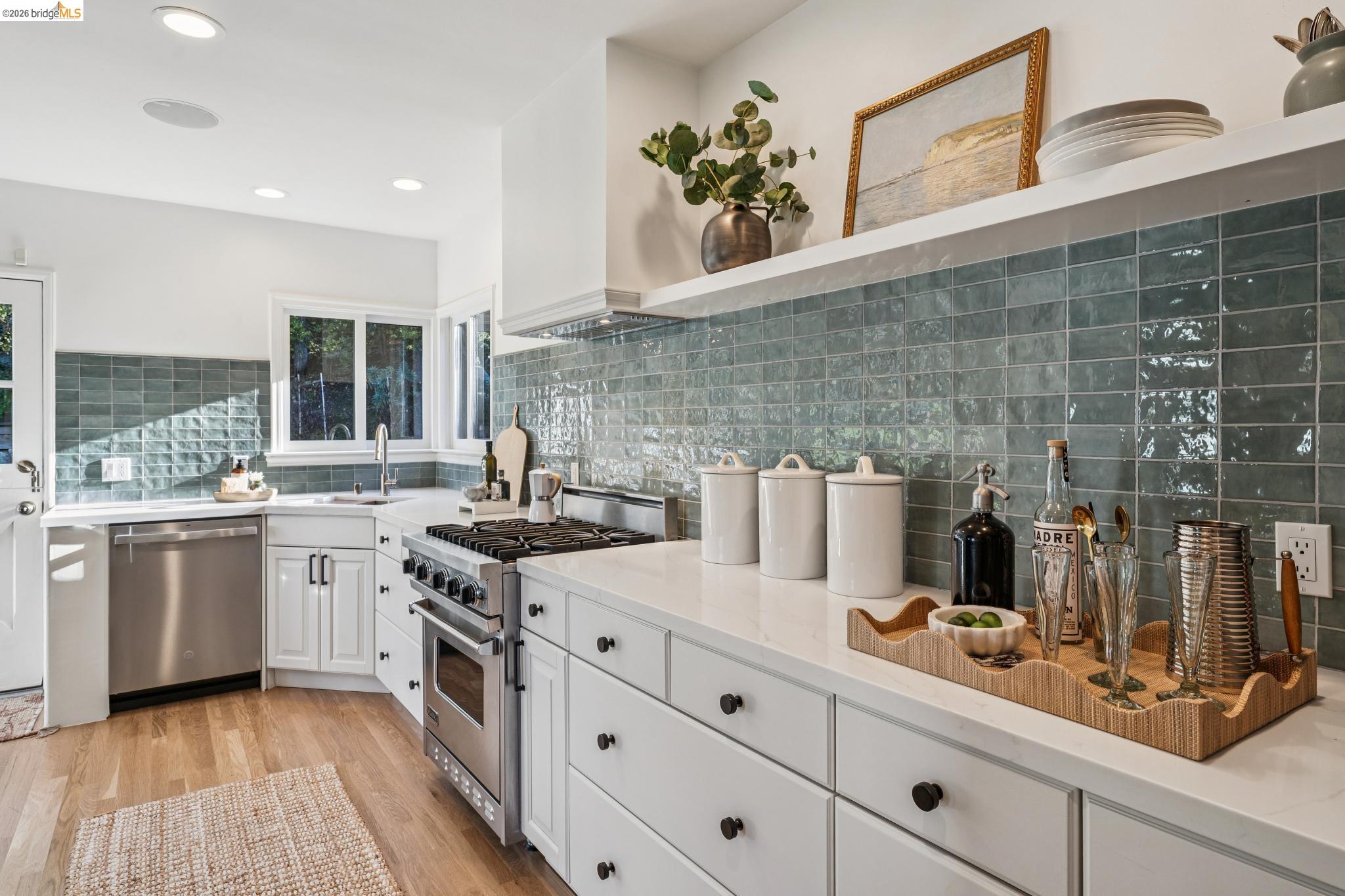 5275 Proctor Avenue Oakland, CA 94618 - Photo 19 of 43 a kitchen with sink stove and cabinets