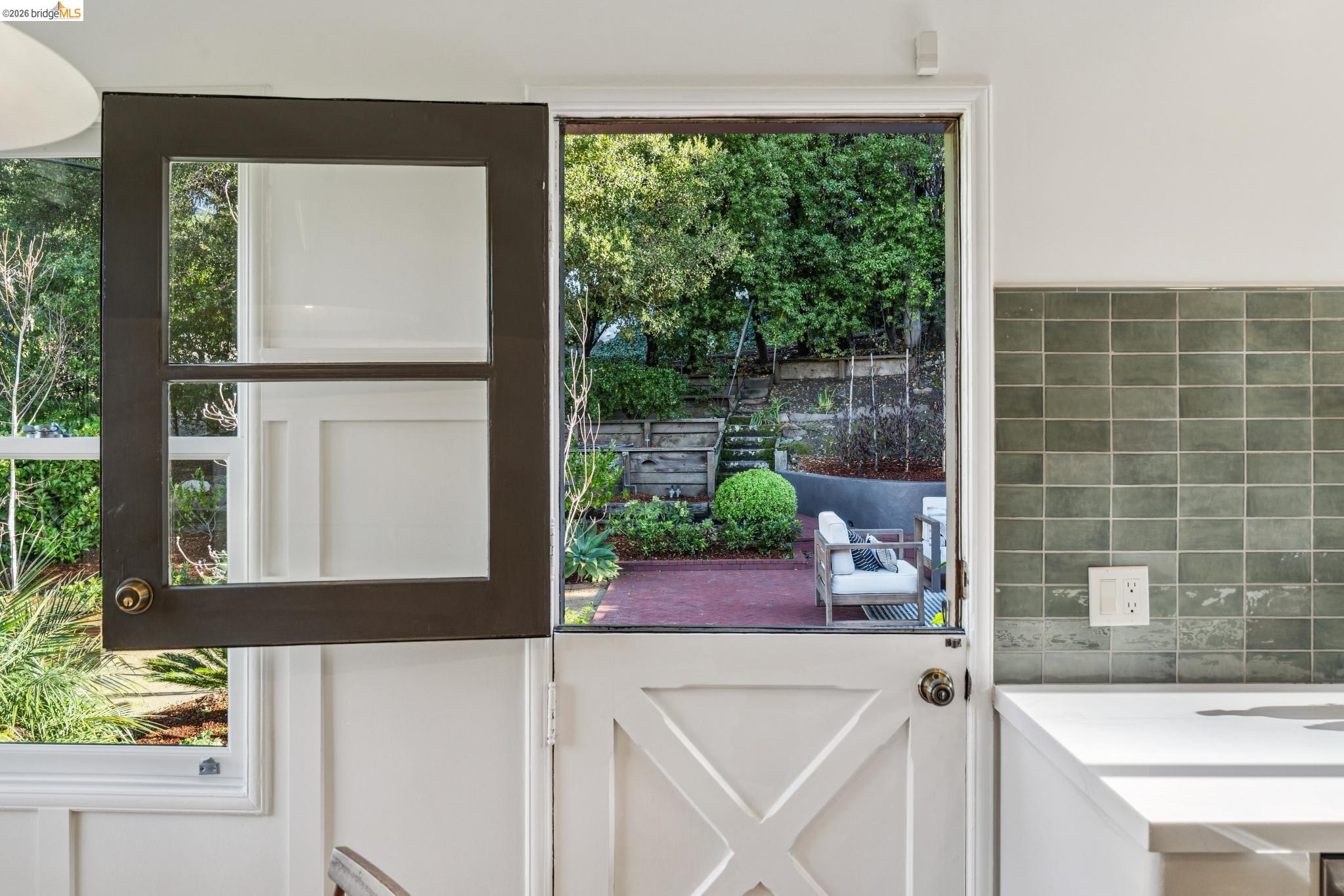 5275 Proctor Avenue Oakland, CA 94618 - Photo 21 of 43 a kitchen with a sink and a large window