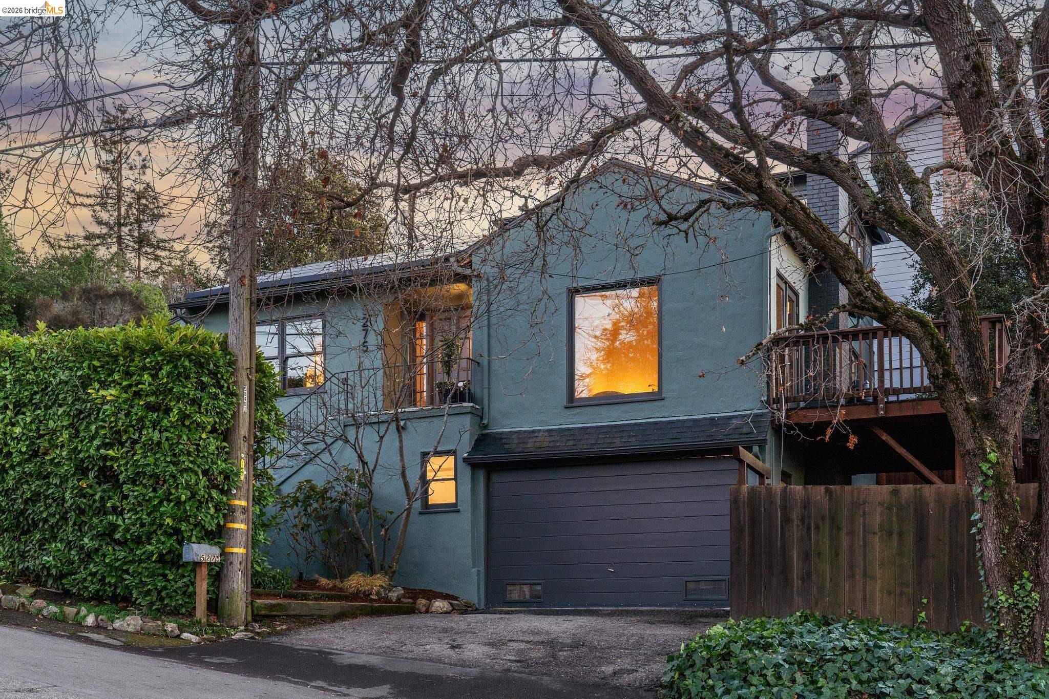 5275 Proctor Avenue Oakland, CA 94618 - Photo 42 of 43 a front view of a house with garden