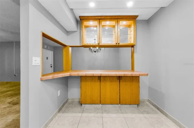 a view of a living room with a large window