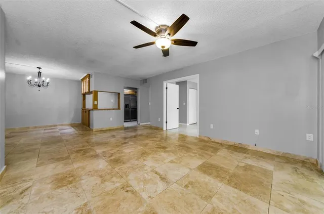 a view of a big room with windows